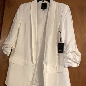 Simply Vera white ruched sleeve blazer.